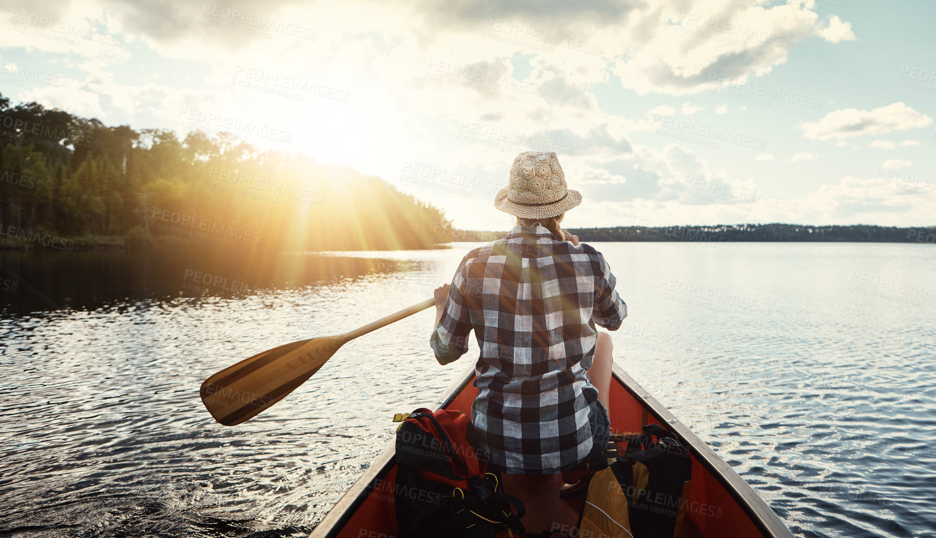 Buy stock photo Person, kayaking and back or paddling on river, relax and water travel or hobby in boat on holiday weekend. Adventure, lake and rowing or tourist activity, calm and outdoor break for fitness