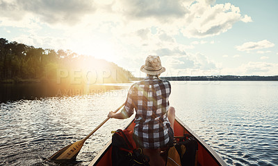 Buy stock photo Person, kayaking and back or paddling on lake, relax and water travel or hobby in boat on holiday weekend. Adventure, river and rowing or tourist activity, calm and outdoor break for fitness