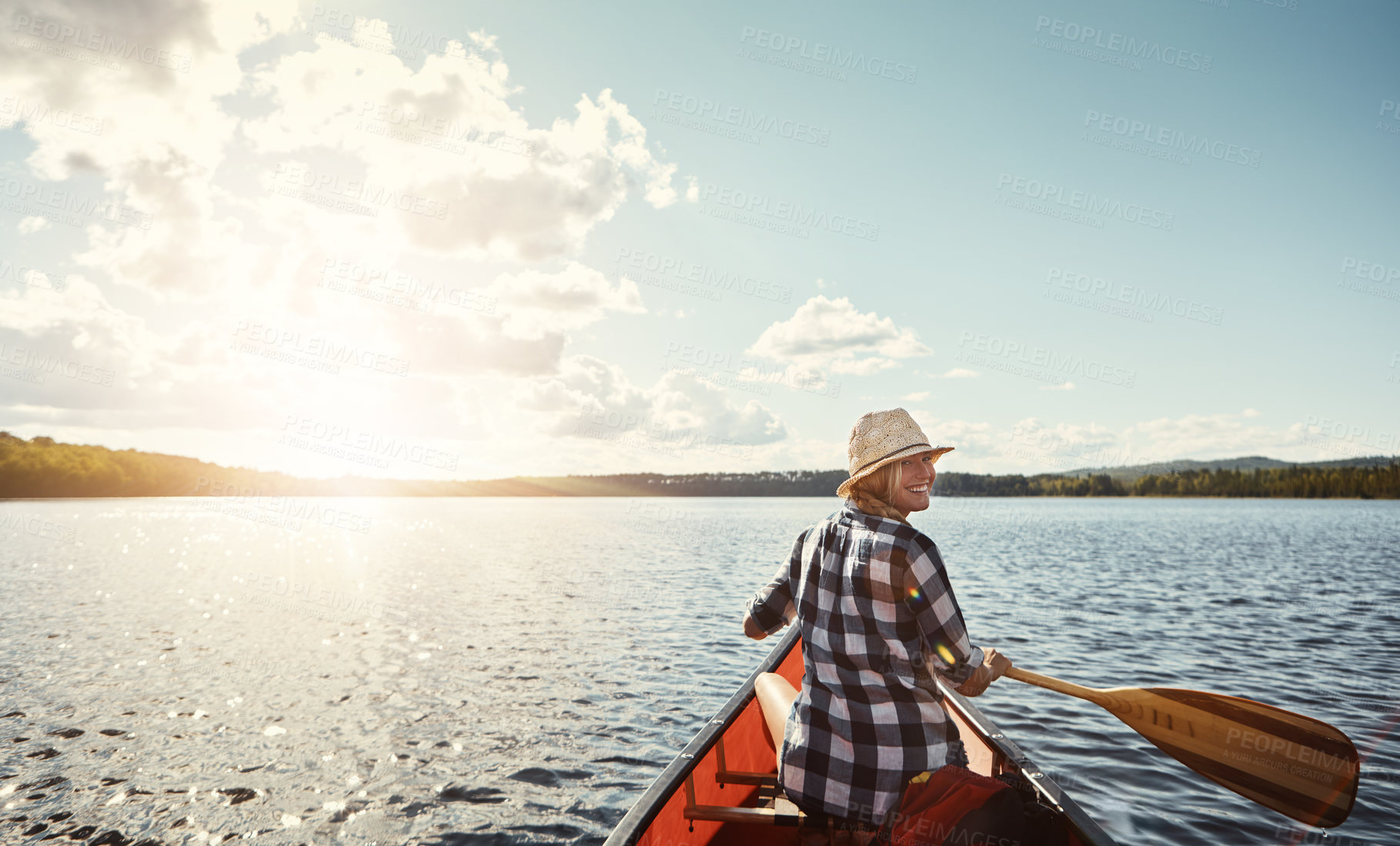 Buy stock photo Portrait of an attractive young woman spending a day kayaking on the lake