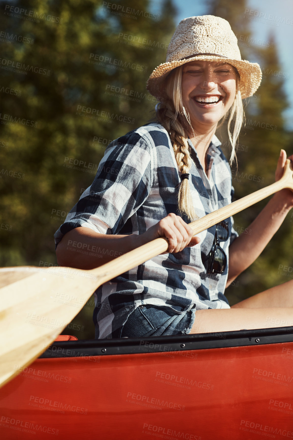 Buy stock photo Portrait of an attractive young woman spending a day kayaking on the lake