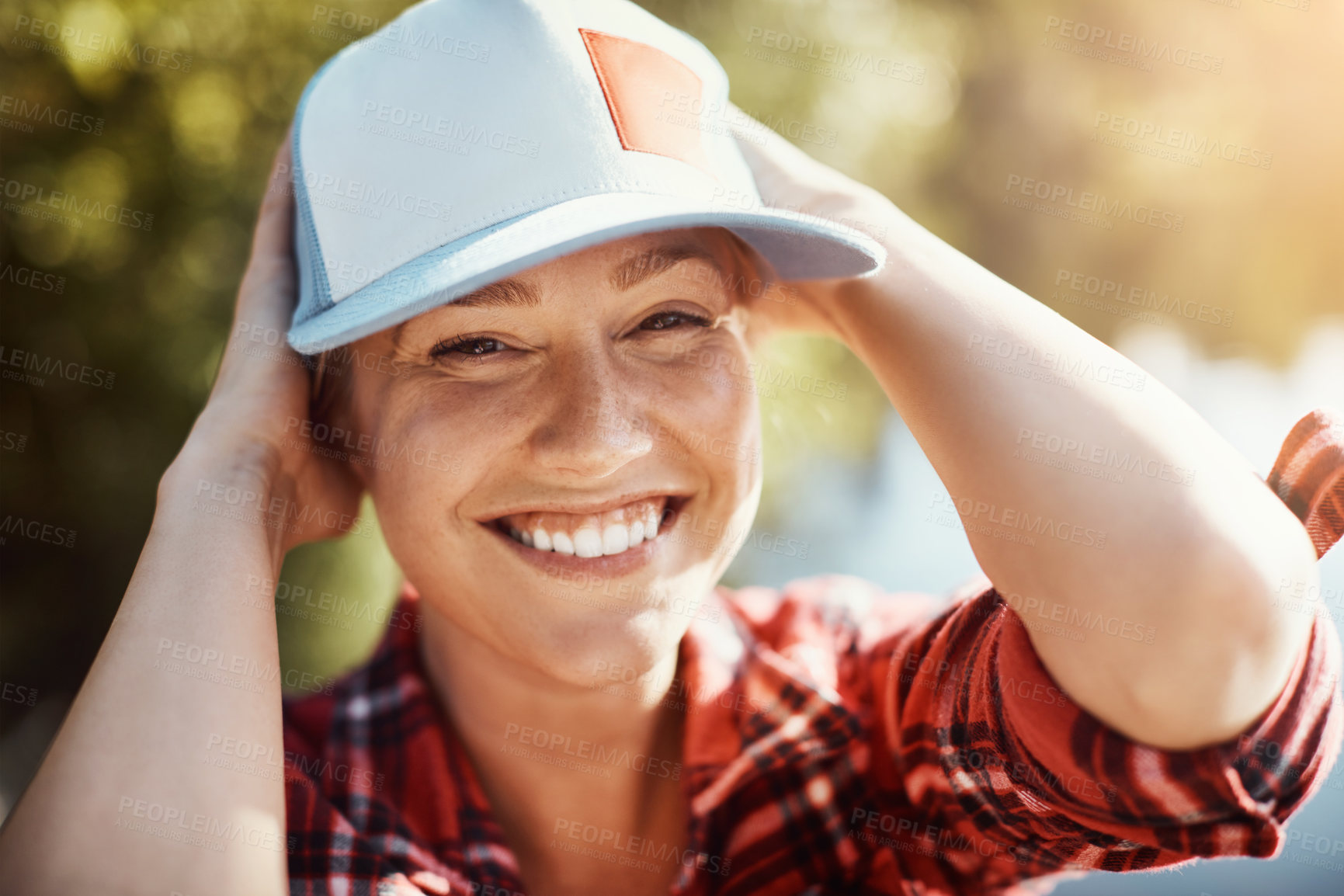 Buy stock photo Shot of a young woman relaxing alone in nature