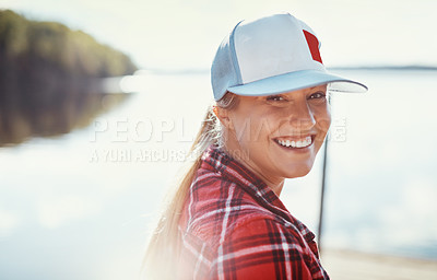 Buy stock photo Shot of a young woman relaxing alone in nature