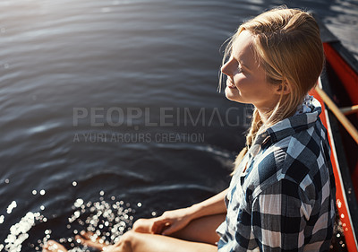 Buy stock photo Woman, lake and holiday with feet in water, relax on vacation with calm in nature for wellness. Female person, happiness and river travel with sunshine, kayak for adventure tourism in Canada