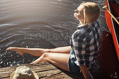 Buy stock photo Woman, lake and holiday with feet in water, relax on vacation with freedom in nature for wellness. Female person, happiness and travel by river with foot splash, kayak for adventure tourism in Canada