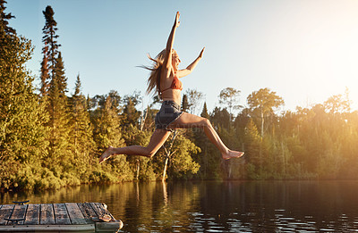 Buy stock photo Jump, woman and lake in nature for swim, fun and refresh in woods for travel adventure. Vacation, river or water for tourism outdoor for female person, happy and holiday in Germany forest in swimsuit