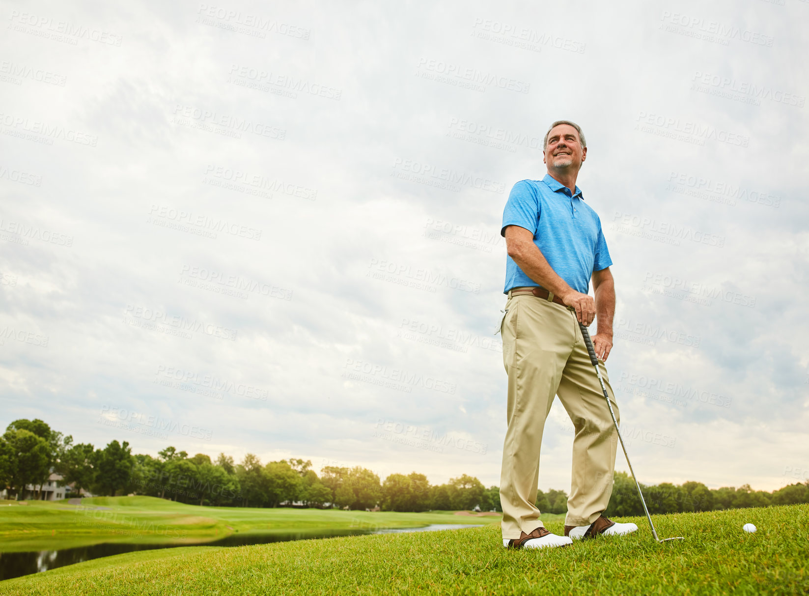 Buy stock photo Mature, man and thinking on golf course or outdoor with club for mental focus, skill and precision or training for tournament. Male golfer, lake and thoughts for game plan, shot strategy and exercise