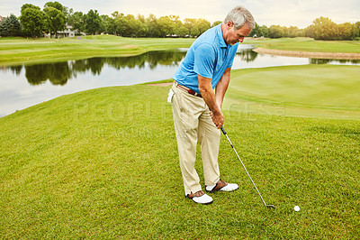 Buy stock photo Mature, man and stroke on golf course or nature with club for mental target, skill and precision or training for tournament. Male golfer, lake and thoughts for game plan, shot strategy and exercise.