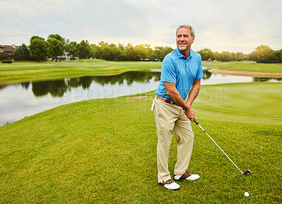 Buy stock photo Mature, man and stroke on golf course or outdoor with club for mental focus, skill and precision or training for tournament. Male golfer, lake and thoughts for game plan, shot strategy and exercise.