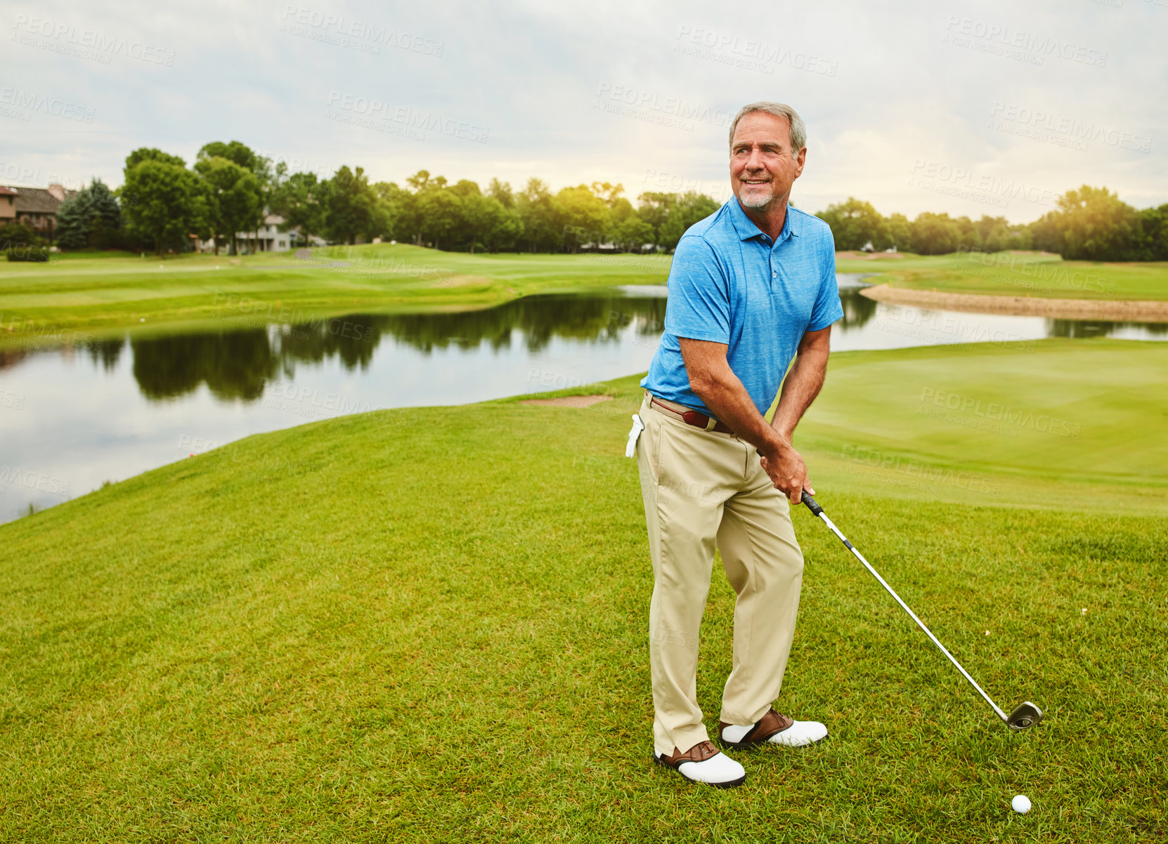 Buy stock photo Mature, man and stroke on golf course or outdoor with club for mental focus, skill and precision or training for tournament. Male golfer, lake and thoughts for game plan, shot strategy and exercise.