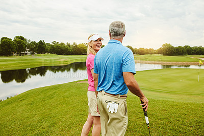 Buy stock photo Smile, mature couple and golf outdoor for fitness challenge, talking and sports support of recreation practice. Happy, woman and man with love for game hobby, lesson and turf discussion of match