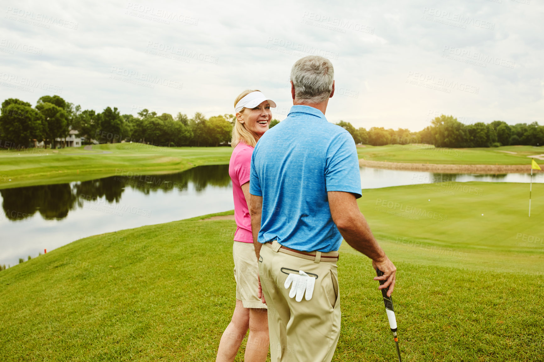 Buy stock photo Smile, mature couple and golf outdoor for fitness challenge, talking and sports support of recreation practice. Happy, woman and man with love for game hobby, lesson and turf discussion of match