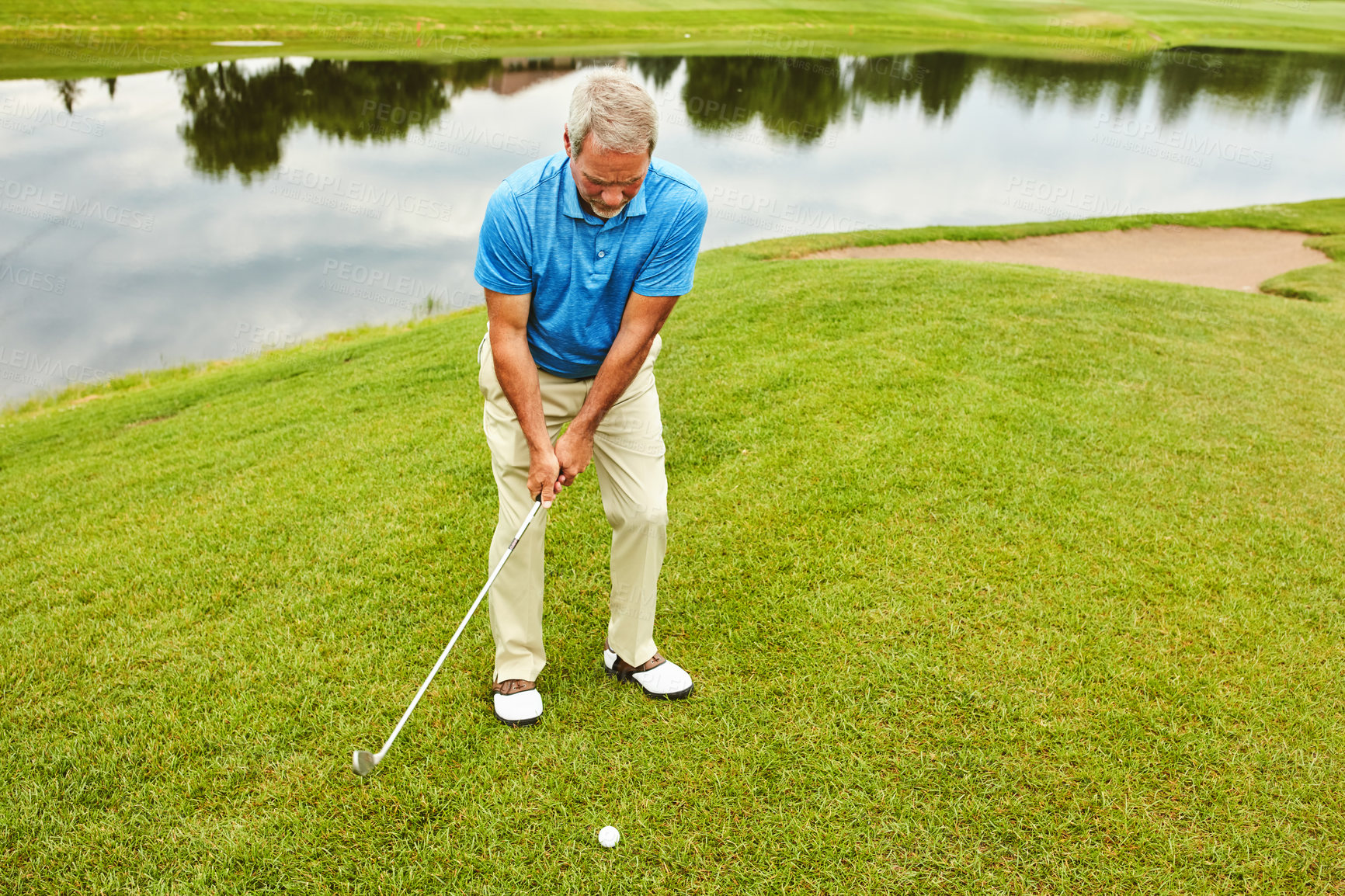 Buy stock photo Mature, man and stroke in nature for golf or recreation sport, coordination and practice for skill or precision for match. Male golfer, club and training for championship competition, turf and play.