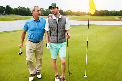 Buy stock photo Outdoor, father and man for golf sport, physical activity and bonding through recreation. People, mature dad and son for walking in nature for friendly competition, game and support in country club