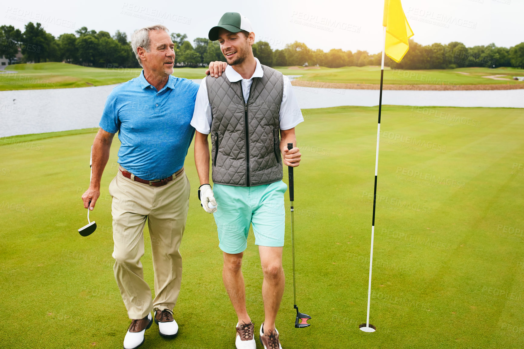 Buy stock photo Outdoor, father and man for golf sport, physical activity and bonding through recreation. People, mature dad and son for walking in nature for friendly competition, game and support in country club