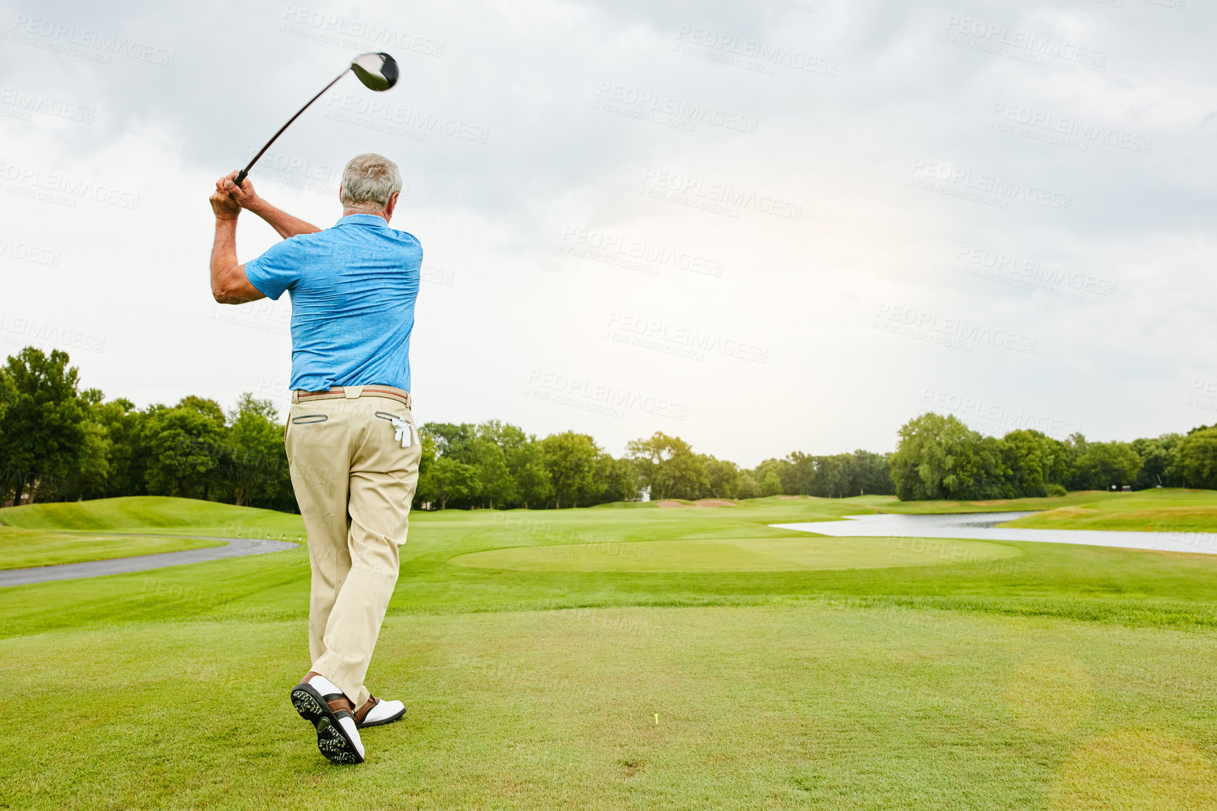 Buy stock photo Mature, man and swinging on golf course or outdoor for recreation sport, practice and training for tournament match. Male golfer, country club and playing with skill for coordination and exercise.