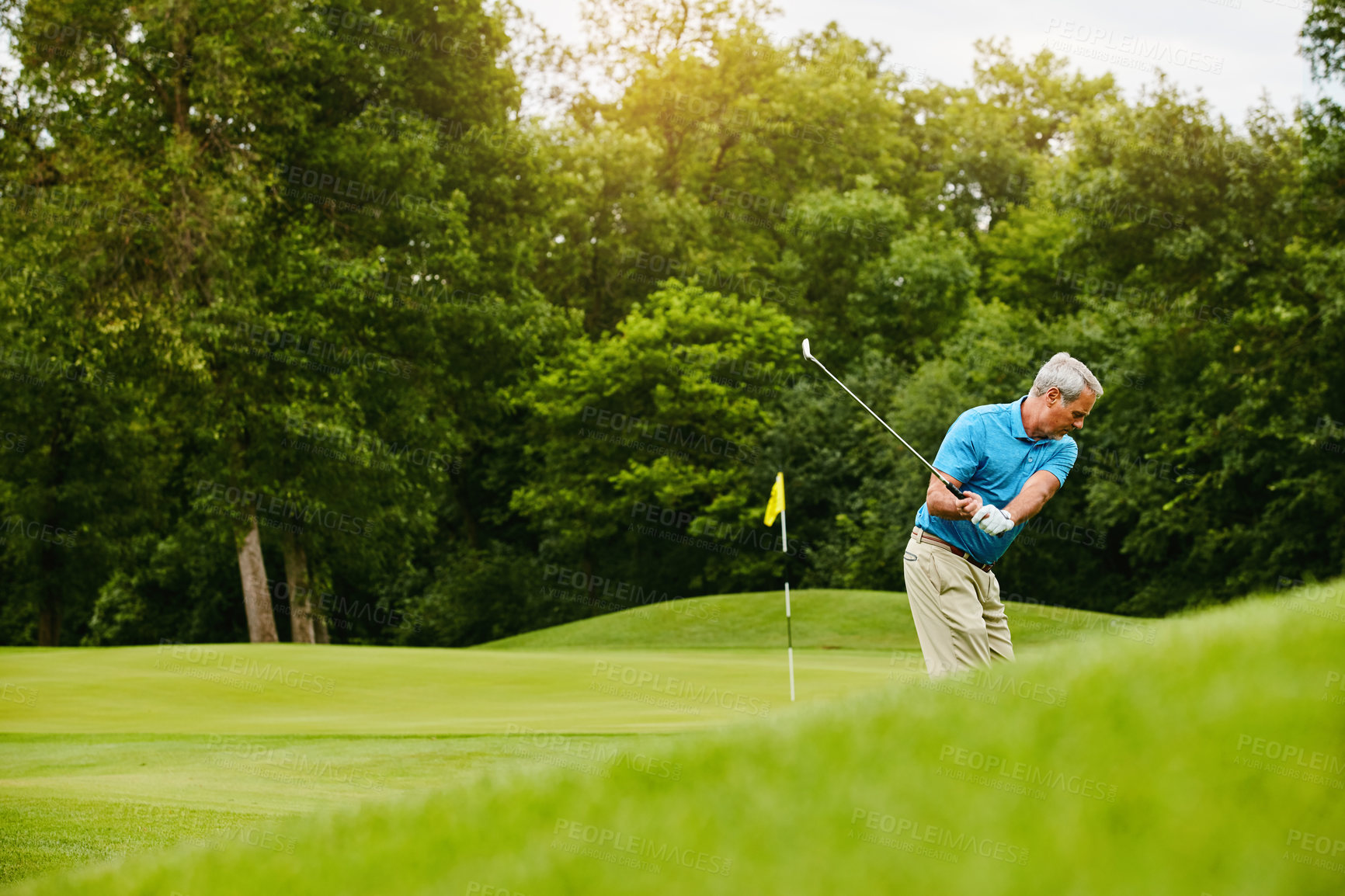 Buy stock photo Old man, golf stroke and sports with retirement, weekend break and playing with grass field, active and hobby. Active, pensioner and mature guy with skills for game, training and swing with action