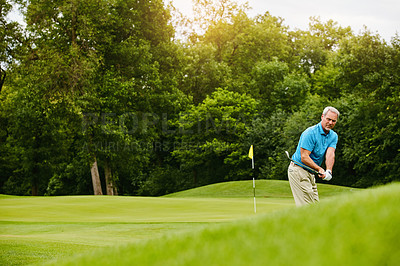 Buy stock photo Senior man, golf stroke and active for wellness, retirement and playing with grass field, practice and hobby. Pensioner, game and mature guy with club, training or sports with break, motion or skills