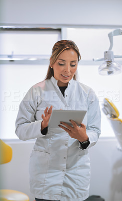 Buy stock photo Research, woman or dentist on tablet in office for appointment schedule or mouth healthcare. Professional, technology or dental doctor on touchscreen in clinic for tooth cleaning services in England