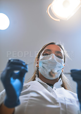 Buy stock photo Woman, dentist and equipment with portrait in hospital for procedure preparation in oral care clinic. Female person, below and dental hygienist for teeth cleaning, examination or root canal treatment