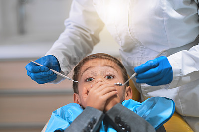 Buy stock photo Portrait, dentist and child with anxiety or fear in hospital for procedure, examination or oral care. Person, doctor and covering mouth for hygienist, teeth cleaning or root canal treatment in clinic