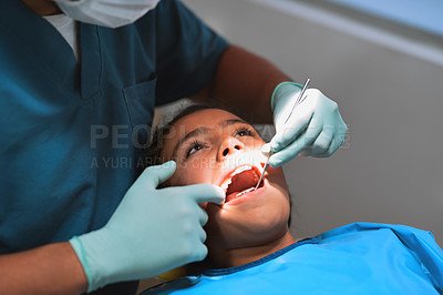 Buy stock photo Hands, child and dentist with mirror for teeth checkup, exam and oral hygiene at pediatric clinic. Girl, tools and orthodontics treatment for tooth, closeup and dental health for root canal or cavity