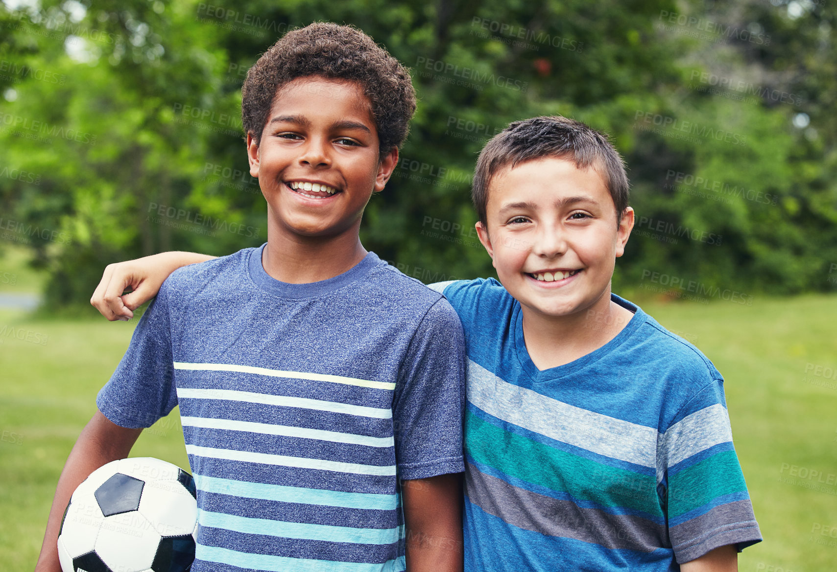 Buy stock photo Children, hug and portrait of friends with soccer ball in park for happiness, development or bonding together. Weekend, nature and boys with smile for embrace, support or playing game in Canada