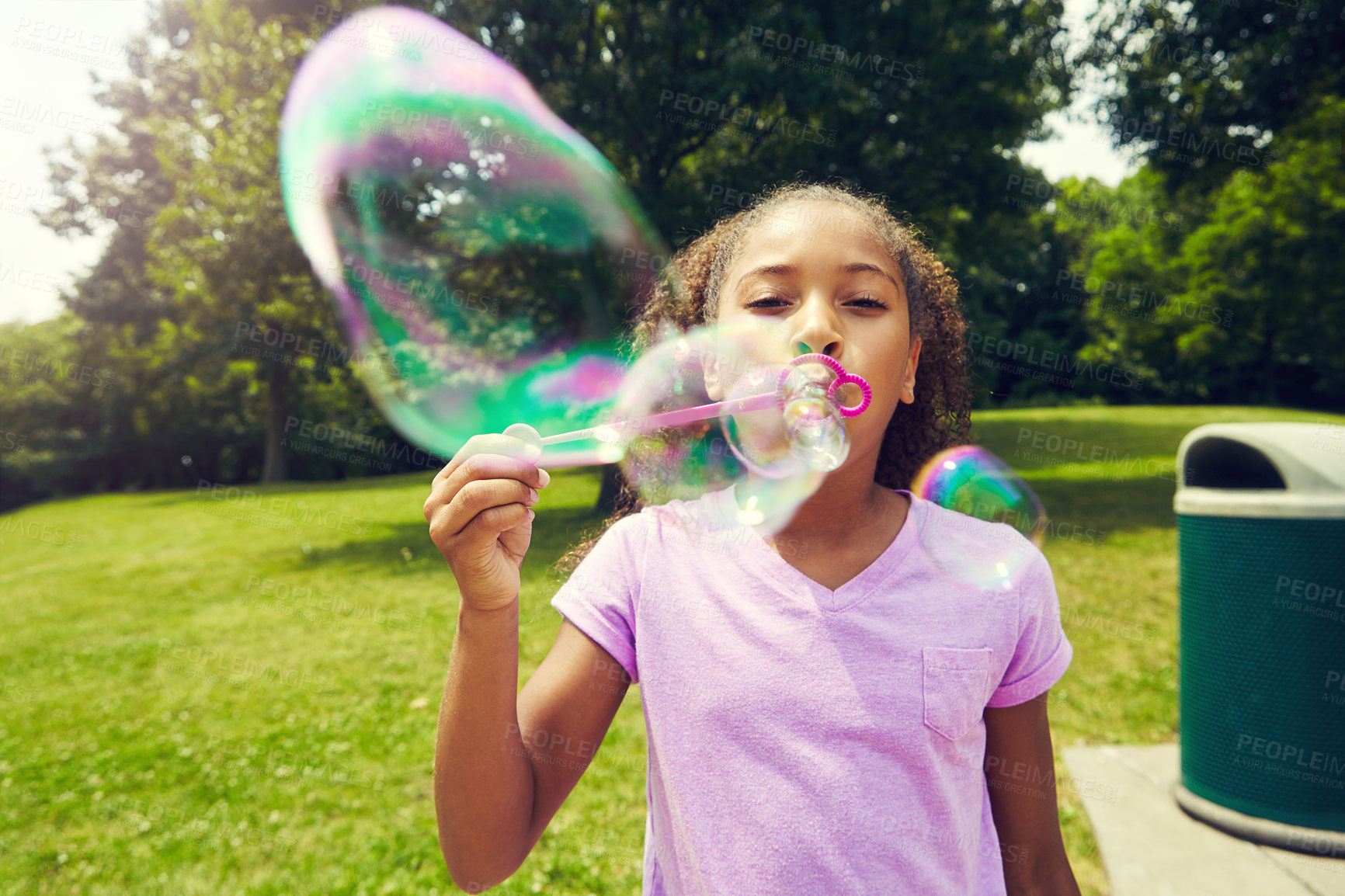 Buy stock photo Children, portrait and girl with bubbles in park for fun, learning and freedom, vacation or games in nature.  Soap, travel or kid in forest with foam magic, hobby or weekend, entertainment or toy
