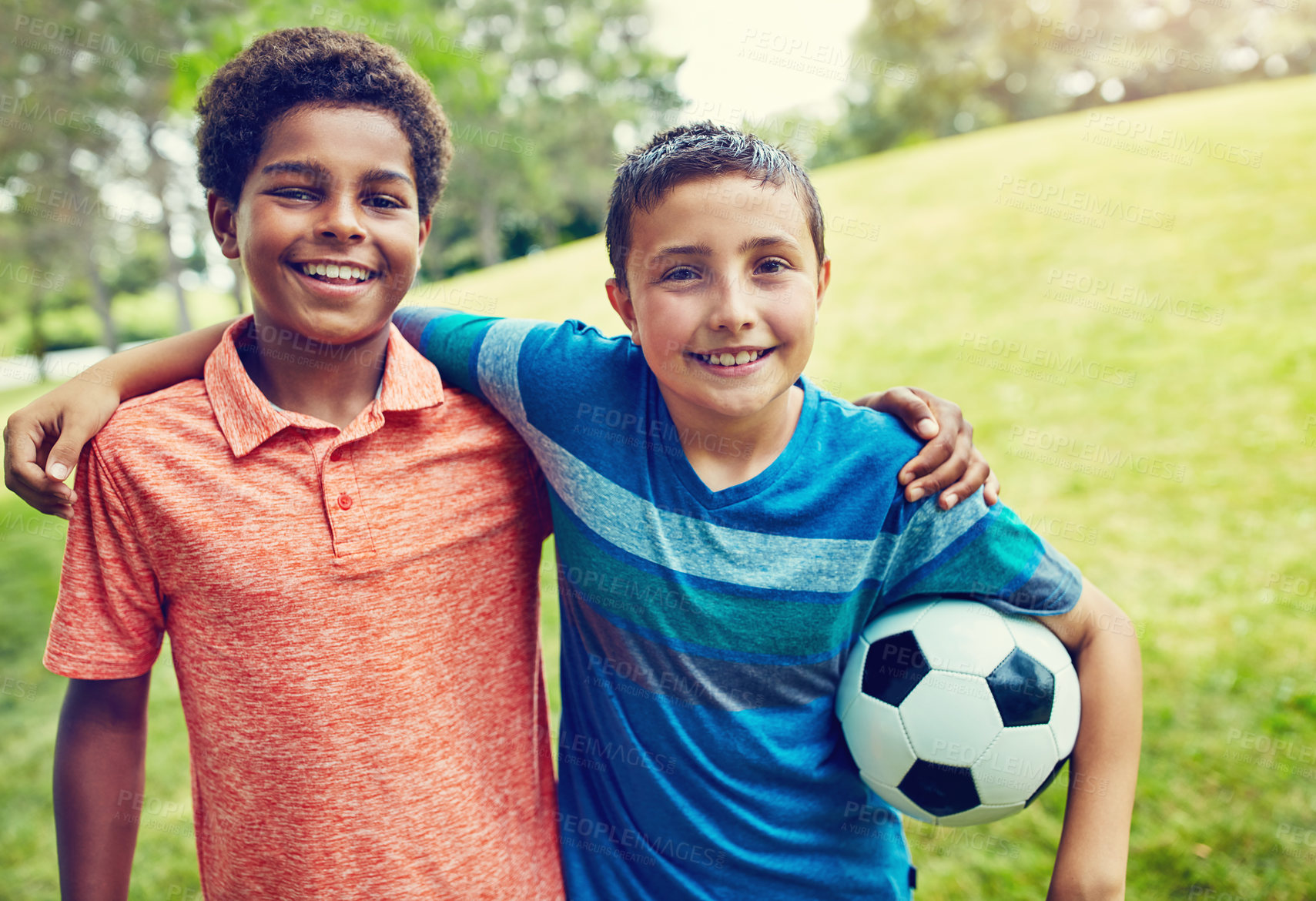 Buy stock photo Soccer ball, friends and portrait of children in park for bonding, hug and outdoor holiday together. Sports, games and happy kids on grass with smile, fun and embrace on summer camp for football.