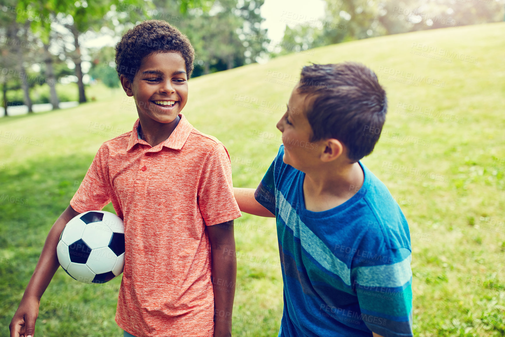 Buy stock photo Soccer ball, support and children in park with smile, bonding and games on outdoor holiday together. Sports, friends and happy kids on grass with growth, fun and diversity on summer camp for football