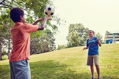 Buy stock photo Shot of adorable young boys playing outdoors