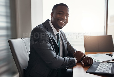 Buy stock photo Cropped portrait of a handsome businessman working in his corporate office