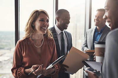 Buy stock photo Cropped shot of a group of corporate businesspeople meeting in their boardroom