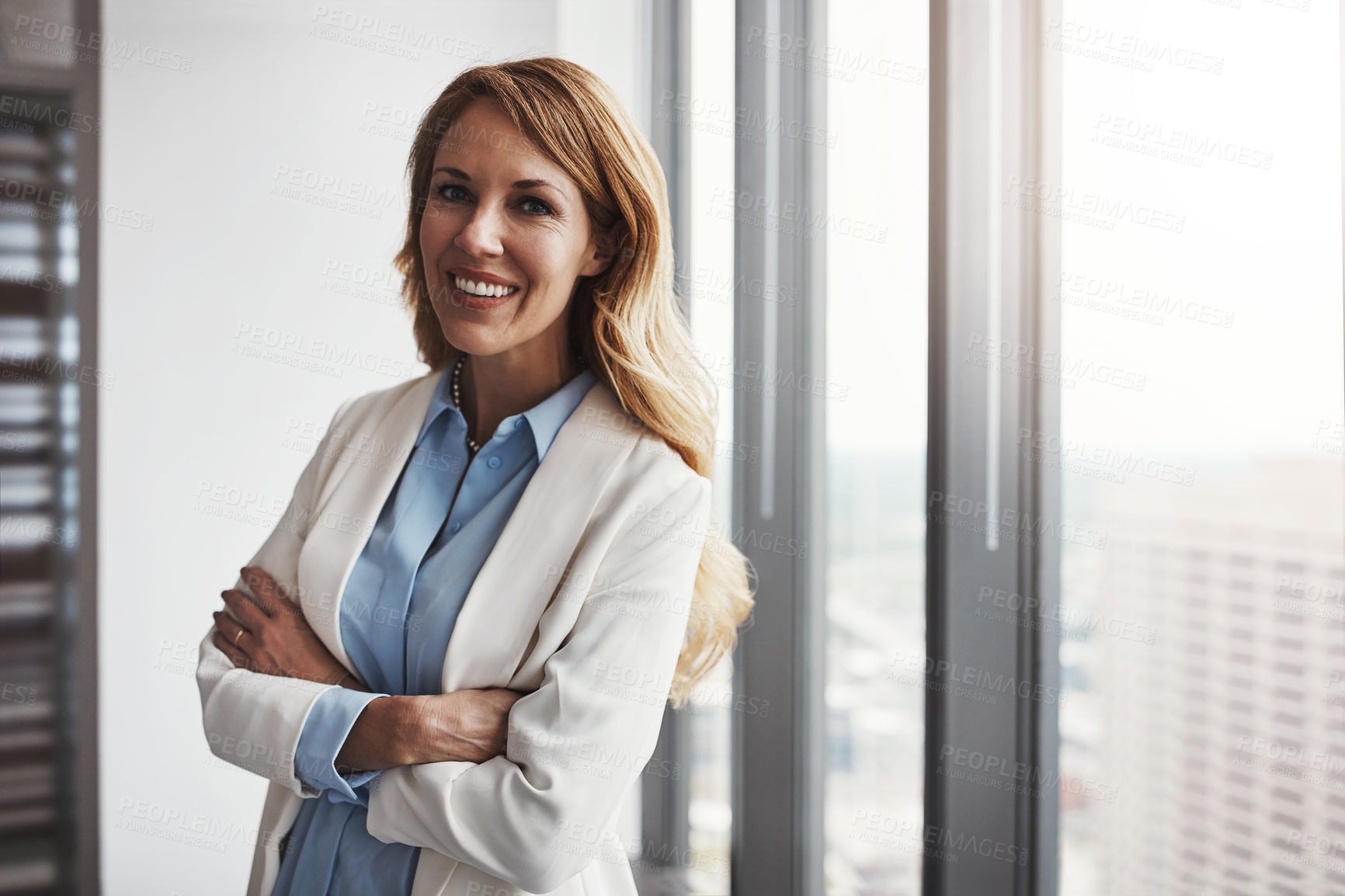 Buy stock photo Portrait of a professional businesswoman standing in an office