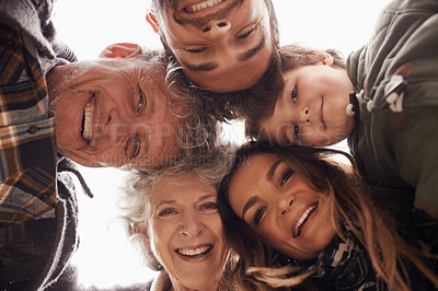 Buy stock photo Faces, smile and below portrait of happy family together on outdoor vacation or holiday feeling excited. Grandparents, happiness and parents in a circle with child or kid for love and care