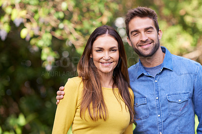 Buy stock photo Couple, outdoor and smile with hug for bonding, love and support to relax and together. Portrait, relationship and  romance with happiness or fun at park as family, soulmate and commitment

