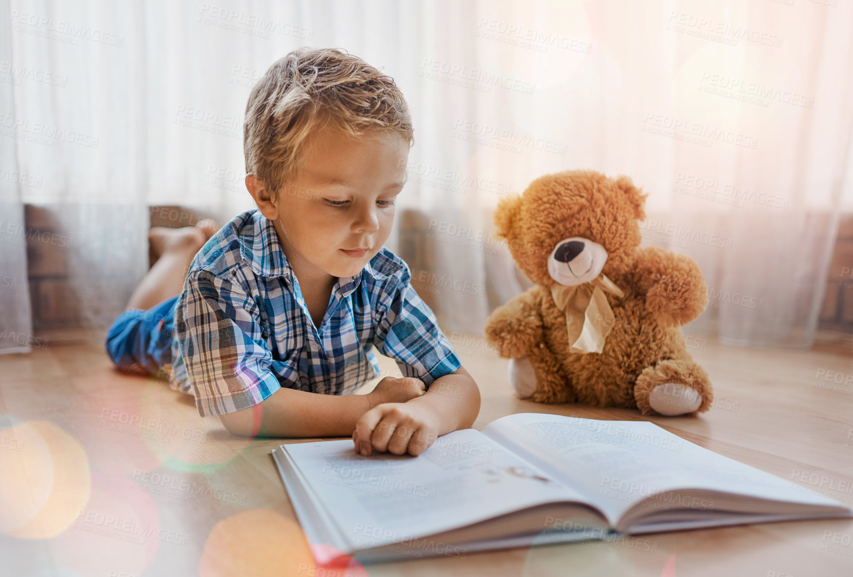 Buy stock photo Reading, teddy bear and child with book on floor in home for bonding, learning or knowledge. Happy, relax and boy kid with fantasy novel, story or literature together with plush toy in house.