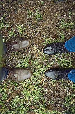 Buy stock photo People, shoes and above with boots on farmland for agriculture, farming or harvest of natural growth. Top view, feet and farmers with dirt on grass field, patch or lawn for horticulture or gardening