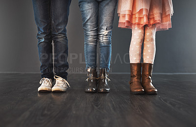 Buy stock photo Cropped studio shot of a group of kids standing against a gray wall