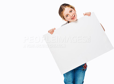 Buy stock photo Poster, happy and portrait of girl on a white background for news, announcement and information. Back to school, advertising and child with sign, space or banner for sale, deal and bargain in studio