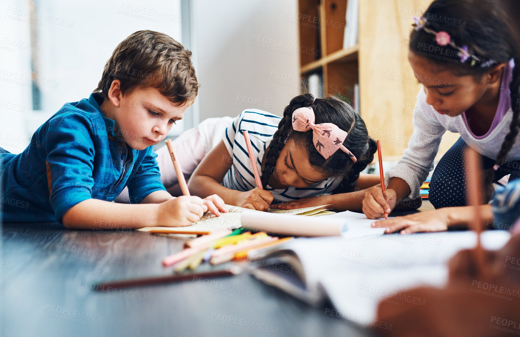 Buy stock photo Drawing, writing and kids on the floor, coloring and diversity with fun, education and development. Children, students or kids on the ground, creative and paper in a room, art and school for learning