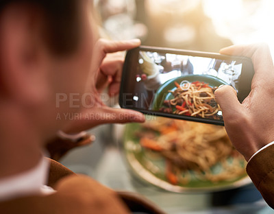 Buy stock photo Hands, phone screen and picture of food at restaurant for social media post, cafe review and spaghetti blog. Display, lunch and person with mobile for photography, fine dining and influencer closeup