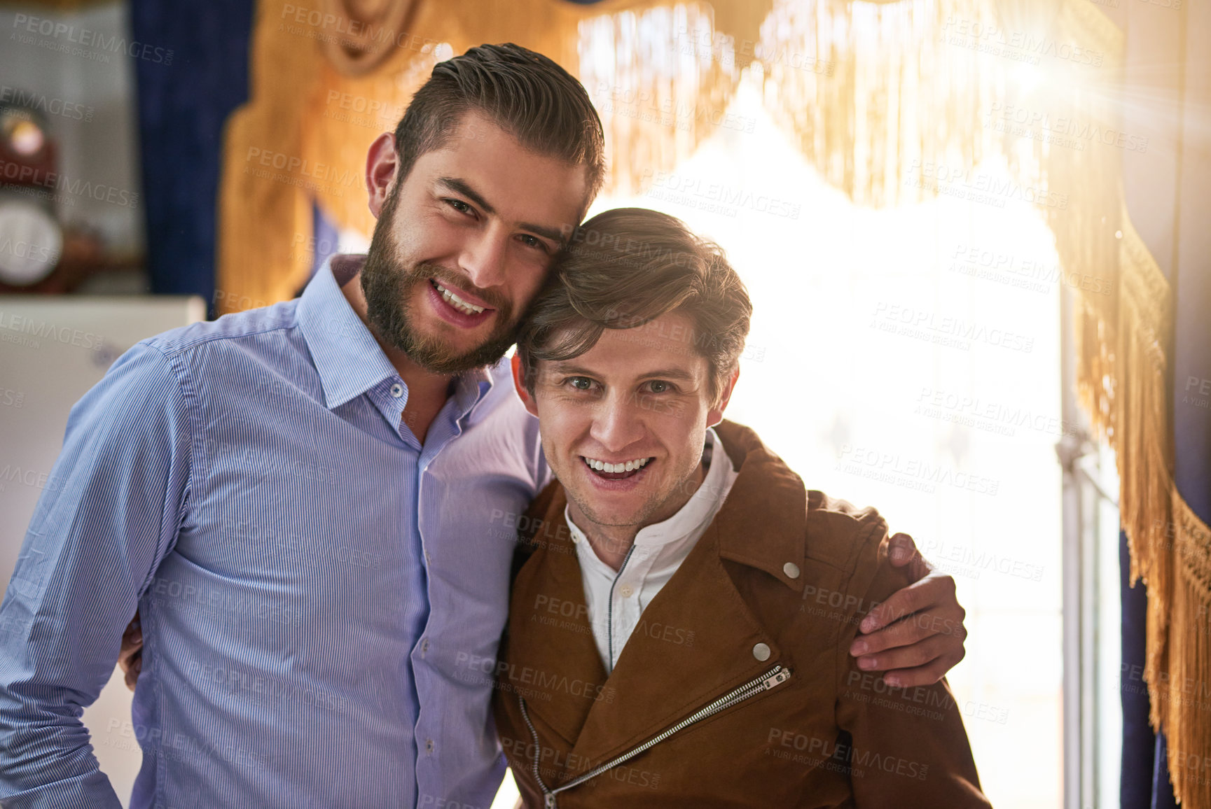 Buy stock photo Gay couple, man and happy in home on portrait for love, support and care in France. People, relationship and smile or satisfied on hug in confidence as lovers with bonding , queer romance and pride