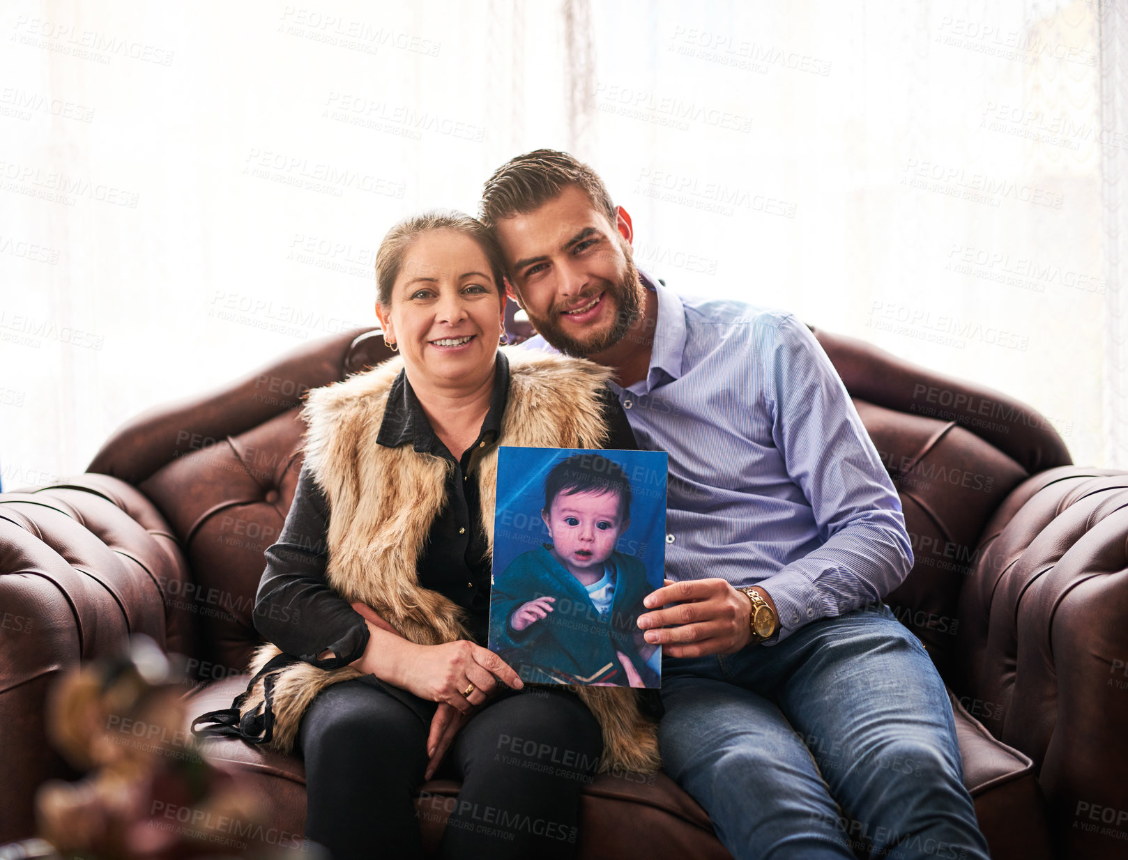 Buy stock photo Photograph, sofa and portrait of mom and son in home for nostalgia, remembering and bonding. Family, love and mature mother and man with picture for album, reminder and relationship in living room