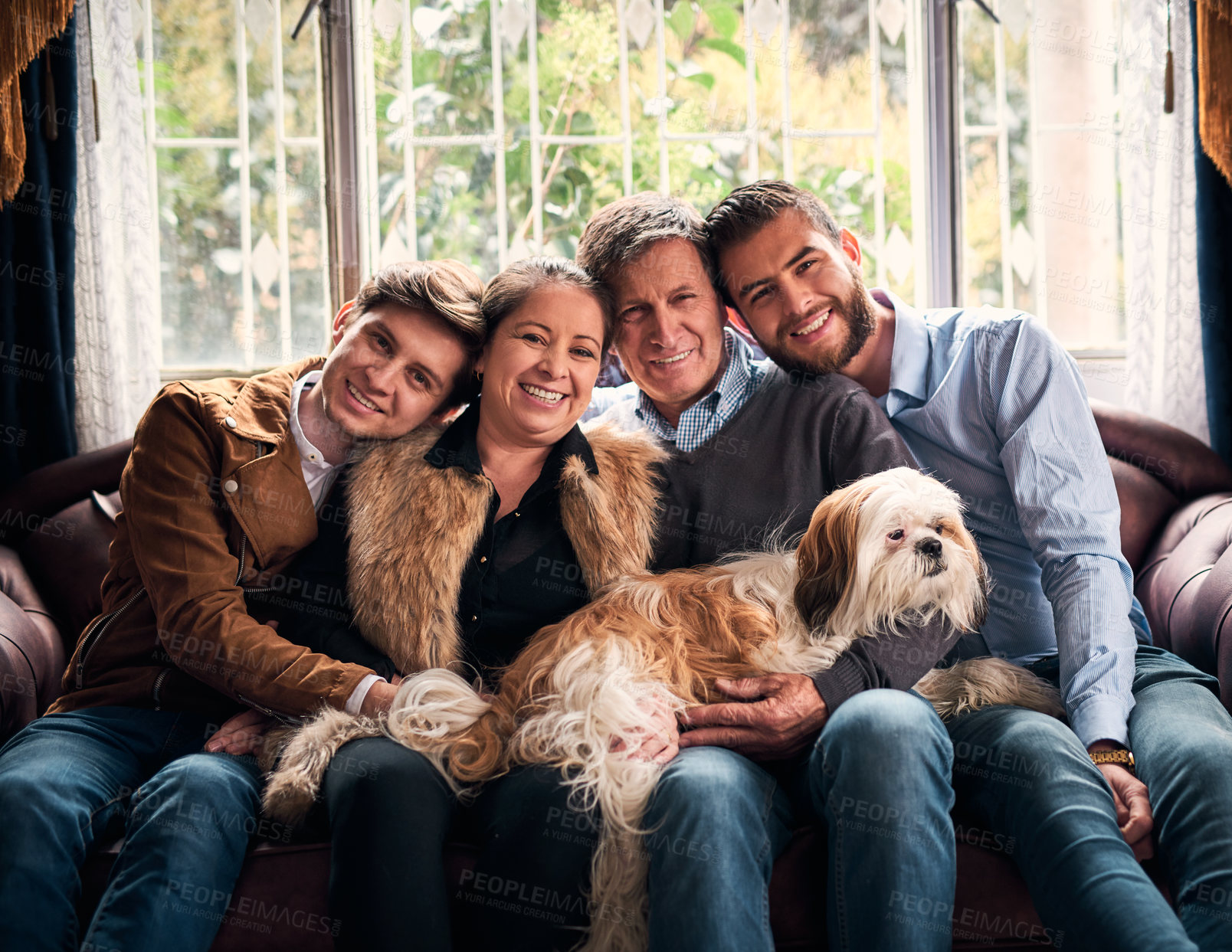 Buy stock photo Happy family, portrait and relax with smile, bonding together and sofa in living room. Senior couple, retirement and visit by men for weekend, reunion or support with mature parents in home lounge