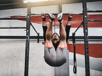 Strengthening his core with some pull ups