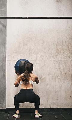 Buy stock photo Fitness, gym and back of woman with ball for bodybuilding training, exercise and cardio workout. Sports, athlete and person with weightlifting equipment for wellness, muscle strength and performance