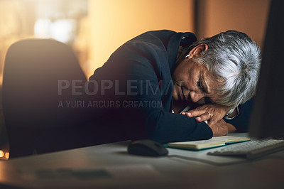 Buy stock photo Burnout, night and businesswoman sleeping in the office to complete a deadline project. Exhausted, tired and mature professional female employee taking a nap while working overtime in the workplace.