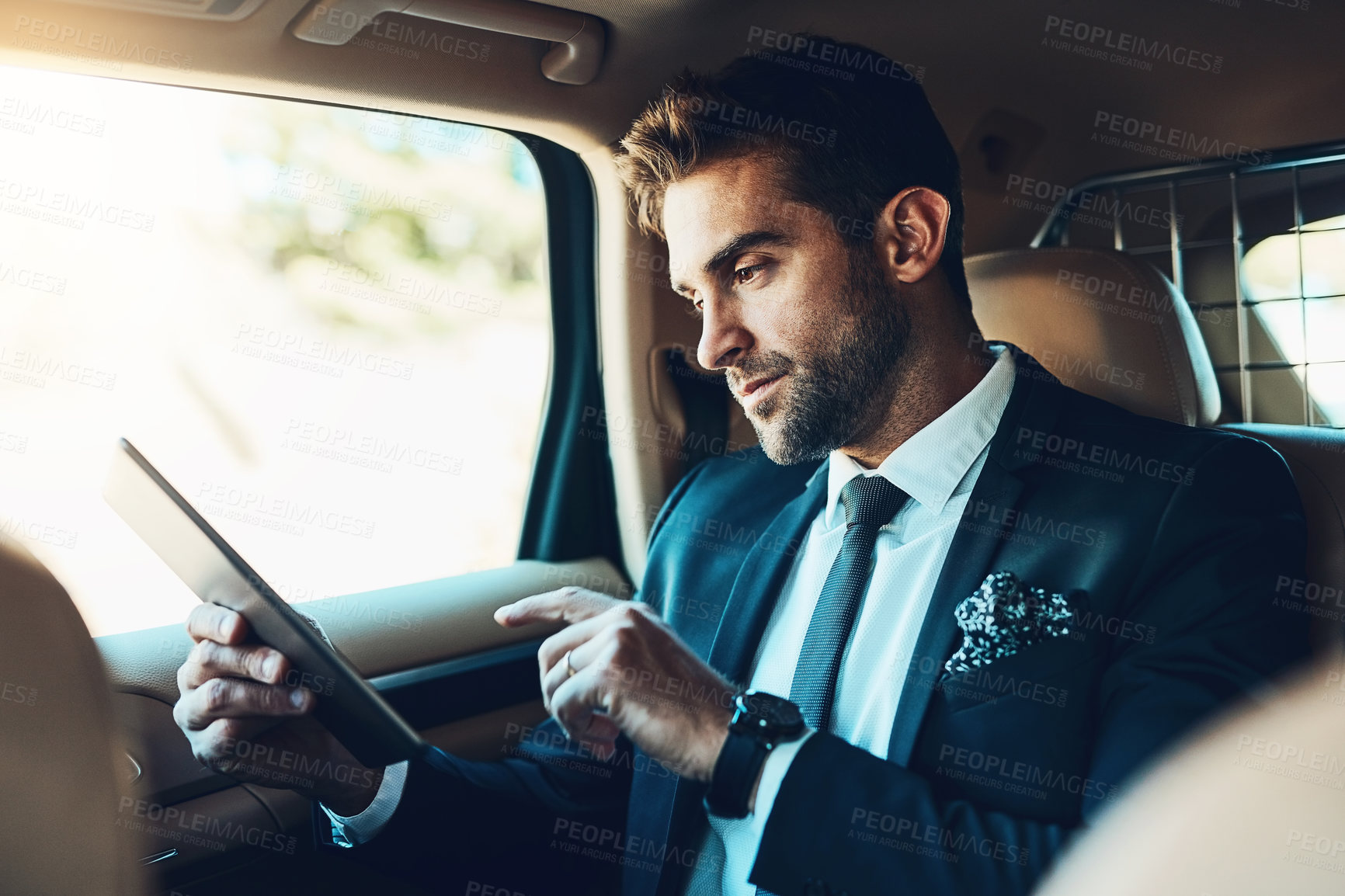 Buy stock photo Professional, man and scroll with tablet in car travel for communication, corporate schedule or information. Vehicle, lawyer and digital app for legal research, reading email and negotiation feedback