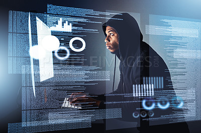 Buy stock photo Shot of a hacker cracking a computer code in the dark