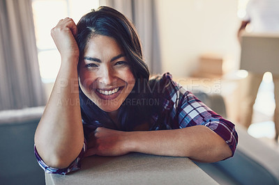 Buy stock photo Portrait of a young woman moving house